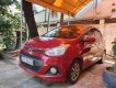 Hyundai Grand i10 2016 - Gia đình bán Hyundai Grand i10 SX 2016, màu đỏ, xe nhập