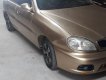 Daewoo Lanos   2001 - Cần bán Daewoo Lanos sản xuất năm 2001, màu vàng