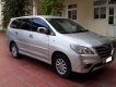 Toyota Innova 2.0E 2013 - Bán ô tô Toyota Innova 2.0E đời 2013, màu bạc, còn mới