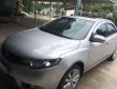 Kia Cerato   2011 - Cần bán Kia Cerato sản xuất 2011, màu bạc, xe gia đình 