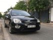 Kia Carens   2009 - Cần bán Kia Carens đời 2009, màu đen, nhập khẩu