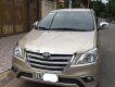 Toyota Innova   2014 - Cần bán Toyota Innova sản xuất 2014, màu vàng, số sàn