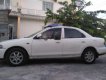 Mazda 323 1997 - Cần bán Mazda 323 đời 1997, màu trắng, nhập khẩu nguyên chiếc, 90 triệu