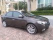 Kia Cerato  AT 2011 - Cần bán gấp Kia Cerato AT 2011, màu xám