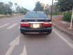 Mazda 626   2002 - Cần bán xe Mazda 626 sản xuất năm 2002, màu đen, 135tr