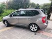 Kia Carens 2009 - Bán ô tô Kia Carens đời 2009, màu xám