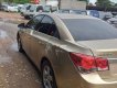 Chevrolet Cruze   2013 - Bán Chevrolet Cruze đời 2013, màu vàng số sàn