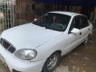 Daewoo Lanos SX 2002 - Cần bán gấp Daewoo Lanos SX đời 2002, màu trắng số sàn