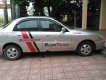 Daewoo Lanos SX 2004 - Bán ô tô Daewoo Lanos SX sản xuất năm 2004, màu bạc