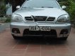 Daewoo Lanos SX 2004 - Bán ô tô Daewoo Lanos SX sản xuất năm 2004, màu bạc