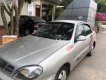 Daewoo Lanos SX 2004 - Bán ô tô Daewoo Lanos SX sản xuất năm 2004, màu bạc