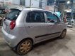 Chevrolet Spark 2011 - Cần bán gấp Chevrolet Spark sản xuất 2011, màu bạc