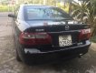 Mazda 626 1.6 2004 - Xe cũ Mazda 626 1.6 sản xuất năm 2004, màu đen, nhập khẩu  