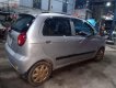 Chevrolet Spark 2011 - Cần bán gấp Chevrolet Spark sản xuất 2011, màu bạc