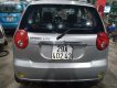 Chevrolet Spark 2011 - Cần bán gấp Chevrolet Spark sản xuất 2011, màu bạc