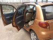 Daewoo Matiz 2004 - Gia đình bán ô tô Daewoo Matiz năm sản xuất 2004, màu nâu 