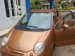 Daewoo Matiz 2004 - Gia đình bán ô tô Daewoo Matiz năm sản xuất 2004, màu nâu 