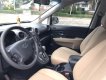 Kia Ceres 2012 - Cần bán Kia Carens SX AT Model 2012, màu đen. Xe gia đình sử dụng kĩ 