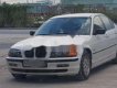 BMW 3 Series 2000 - Cần bán lại xe BMW 323i sản xuất 2000, màu trắng