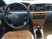 Toyota Corolla altis 2005 - Cần bán Corola Altis 2005 số sàn, màu đen xe zin cọp