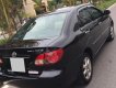 Toyota Corolla altis 2005 - Cần bán Corola Altis 2005 số sàn, màu đen xe zin cọp