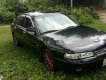 Mazda 626 1996 - Cần bán lại xe Mazda 626 sản xuất 1996, màu đen, xe nhập