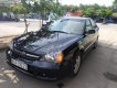 Daewoo Magnus 2005 - Bán Daewoo Magnus sản xuất 2005, màu đen, số tự động 