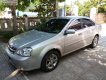 Daewoo Lacetti EX 2009 - Cần bán Daewoo Lacetti ex năm sản xuất 2009, màu bạc