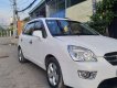 Kia Carens   2010 - Cần bán Kia Carens đời 2010, màu trắng số sàn