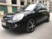 Kia Carens 2010 - Gia đình nâng đời bán Kia Carens 2010, màu đen số tự động