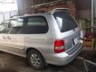 Kia Carnival GS 2.5 MT 2006 - Bán Kia Carnival GS 2.5 MT 2006, màu bạc xe gia đình