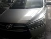 Toyota Innova 2016 - Cần bán lại xe Toyota Innova năm 2016, màu bạc số sàn