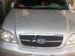 Kia Carnival GS 2.5 MT 2006 - Bán Kia Carnival GS 2.5 MT 2006, màu bạc xe gia đình