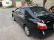 Toyota Vios 2009 - Cần bán xe Toyota Vios năm 2009, màu đen xe gia đình