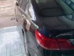 Toyota Camry 2009 - Cần bán lại xe Toyota Camry năm sản xuất 2009, màu đen xe nguyên bản