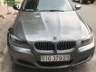 BMW 3 Series 2010 - Cần bán lại xe BMW 320i đời 2010, màu xám, nhập khẩu