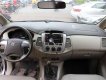 Toyota Innova 2014 - Cần bán gấp Toyota Innova năm 2014, màu bạc đẹp như mới