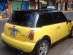 Mini Cooper 2004 - Cần bán Mini Cooper năm 2004, màu vàng chính chủ, giá 275tr, xe nguyên bản