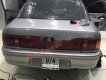 Mazda 323 1995 - Cần bán xe Mazda 323 đời 1995, màu bạc chính chủ, 52 triệu, xe máy còn êm