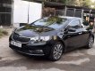 Kia K3    2014 - Cần bán Kia K3 năm sản xuất 2014, màu đen