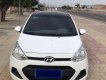 Hyundai Grand i10    MT 2014 - Cần bán Hyundai Grand i10 MT sản xuất 2014, màu trắng, nhập khẩu xe gia đình