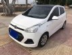 Hyundai Grand i10    MT 2014 - Cần bán Hyundai Grand i10 MT sản xuất 2014, màu trắng, nhập khẩu xe gia đình