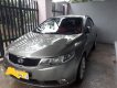 Kia Forte   MT 2010 - Bán ô tô Kia Forte MT năm sản xuất 2010, màu xám, giá tốt