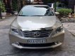 Toyota Camry   2014 - Bán Toyota Camry đời 2014, màu vàng, giá 850tr