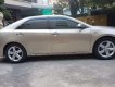 Toyota Camry   2014 - Bán Toyota Camry đời 2014, màu vàng, giá 850tr