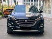 Hyundai Tucson   2018 - Cần bán Hyundai Tucson đời 2018, màu đen còn mới, giá tốt