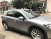 Mazda CX 5 2014 - Bán Mazda CX 5 đời 2014, màu bạc xe nguyên bản