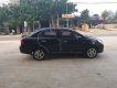 Chevrolet Aveo 2015 - Bán xe cũ Chevrolet Aveo sản xuất 2015, màu đen