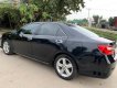 Toyota Camry 2015 - Cần bán Toyota Camry đời 2015, màu đen giá chỉ 825 triệu xe còn mới