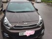 Kia Rio 1.4 AT 2015 - Bán xe cũ Kia Rio đời 2015, màu nâu, nhập khẩu